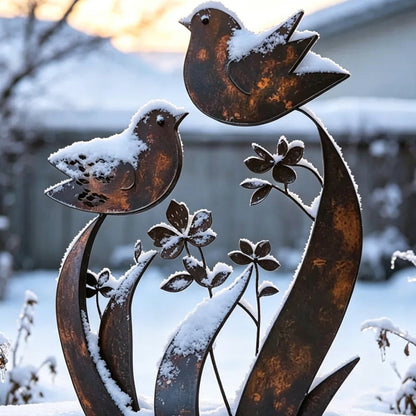 Iron garden stake with bird and flower motif